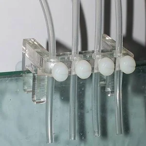 Dosing-pump-tube-holder